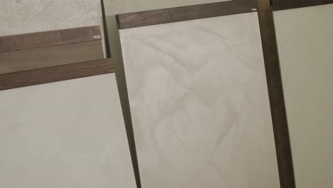 samples of decorative plasters on panels