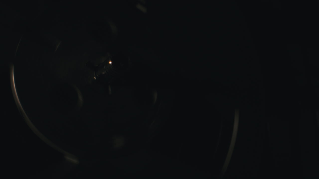 A vintage tape recorder in a blinking light