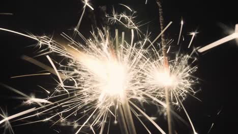 close-up of a sparkler on black background