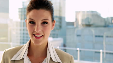 pretty businesswoman smiling at camera