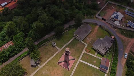 aerial of a beautiful park on top of the oke are hill in ibadan, nigeria with the historical bowers tower on top of the hill