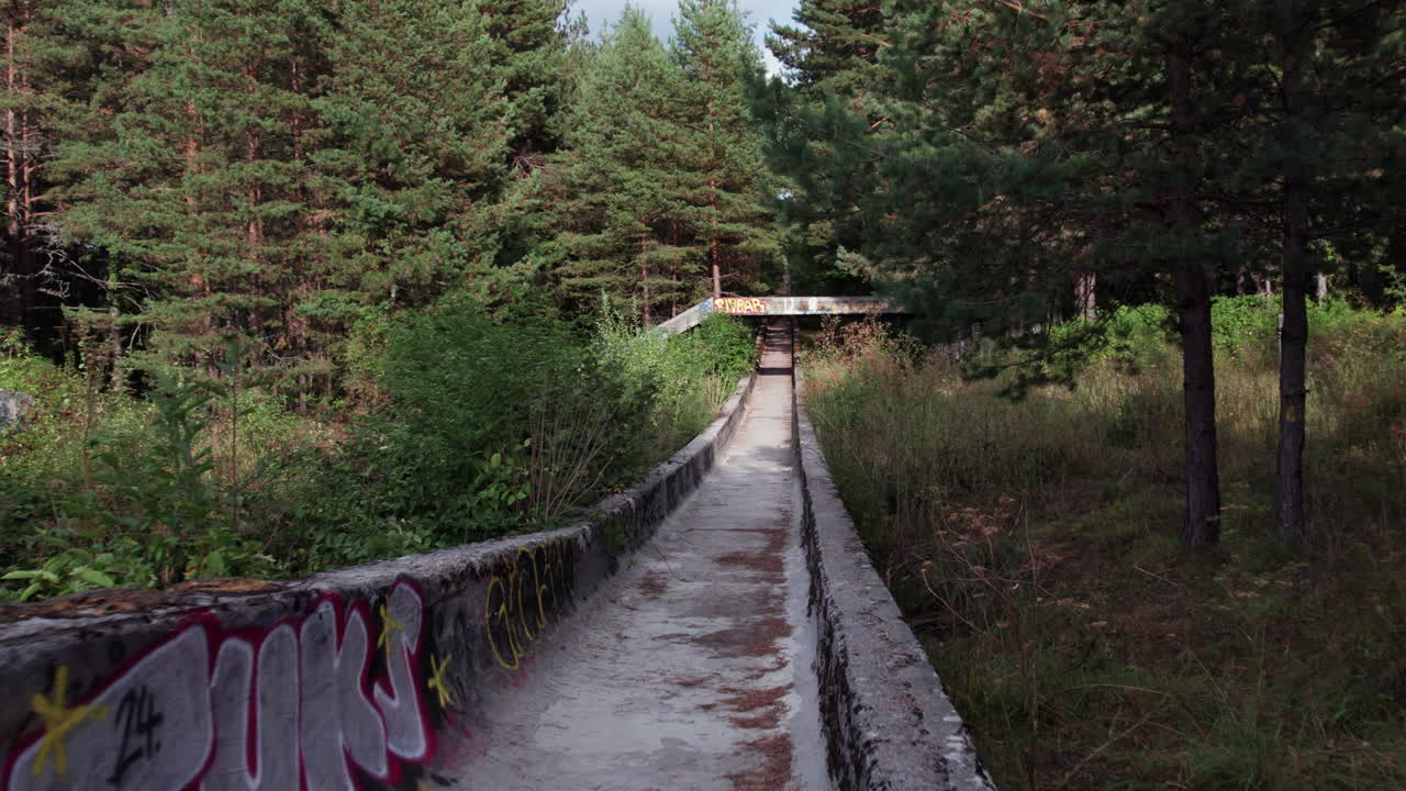 Old Olympic bobsleigh track from 1984 on Trebevic mountain near Sarajevo, now abandoned and overgrown