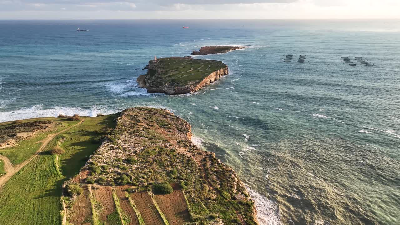 Sunrise Drone Video Flying Towards Saint Paul's Islands in Malta