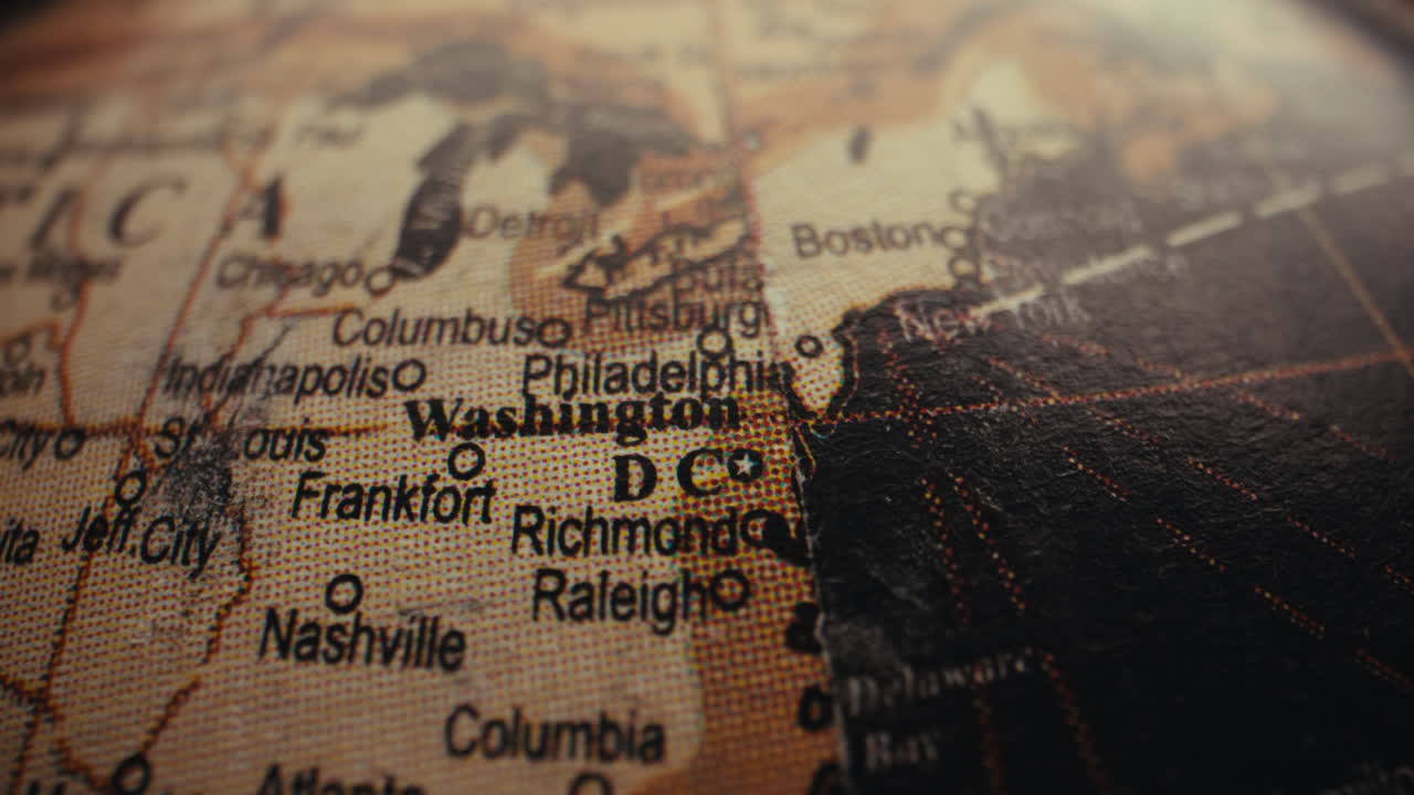 Close-up of a vintage world globe showing the United States and Washington D.C.