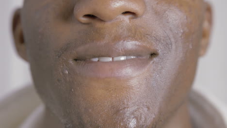 smiling lips of young african american man