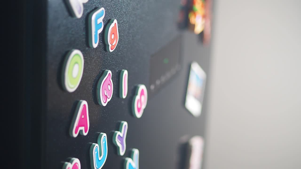 Refrigerator magnets on a black fridge