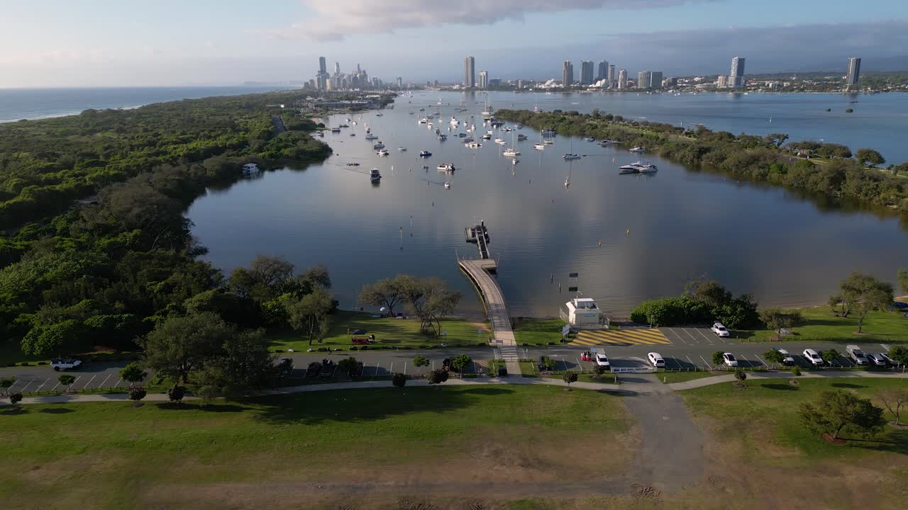 Left to right aerial view over Doug Jennings Park looking South towards Surfers Paradise, Gold Coast, Australia.