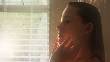 Woman-taking-a-shower-in-bathroom