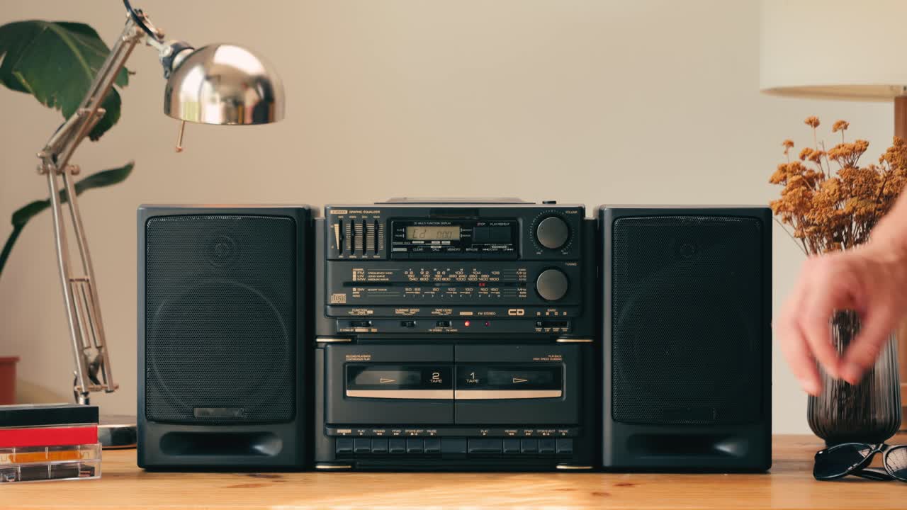 Retro radio tape recorder, audio cassette close-up. Listening to music, old radio boom box player, macro of vintage music listening. . High quality 4k footage