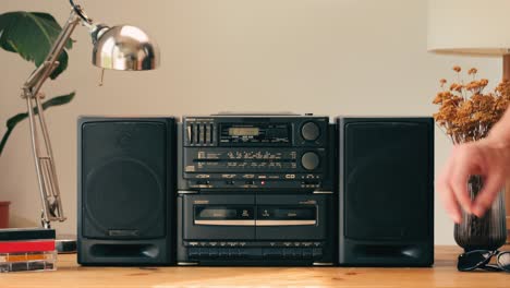 retro radio tape recorder, audio cassette close-up. listening to music, old radio boom box player, macro of vintage music listening. . high quality 4k footage