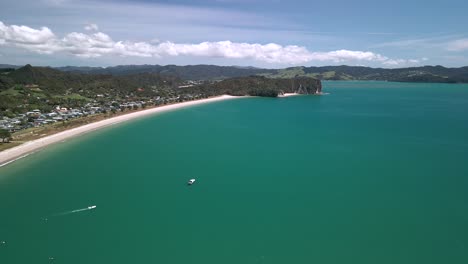 boat moored in stunning cooks bay, new zealand