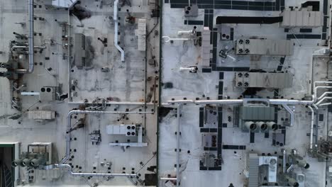 top down aerial descending shot of hvac on top of laboratory in america