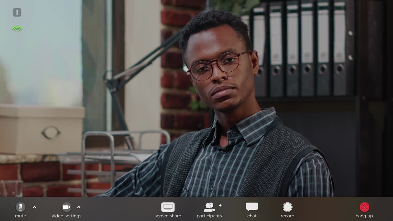 African american man using online video call meeting