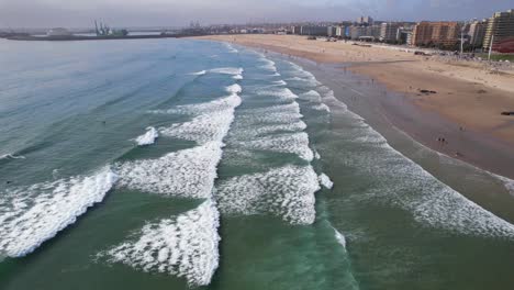 aerial shot of the sandy matosinhos beach in porto, portugal