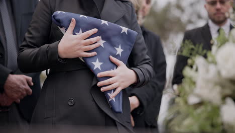 hands, american flag and death with a person