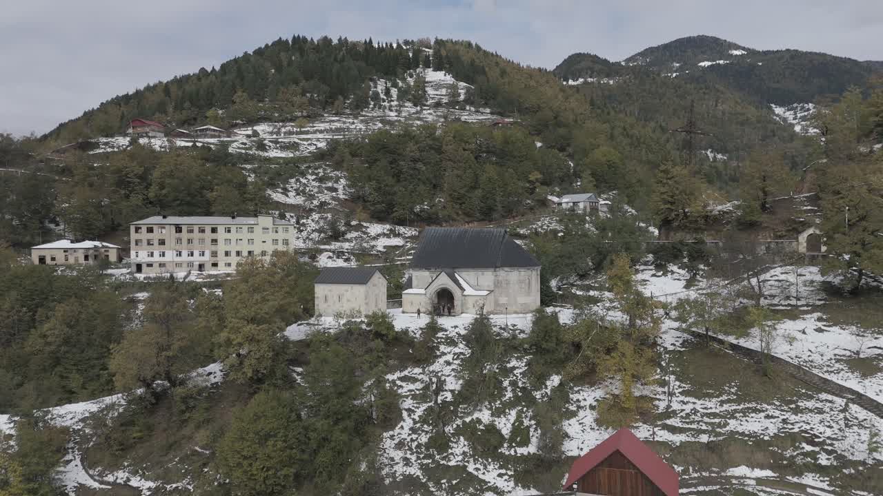 Cinematic daytime drone footage of a church in Ajaria, Georgia.