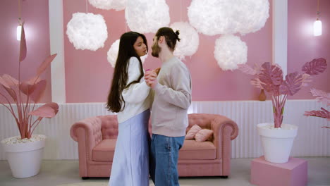 couple dancing in the living room