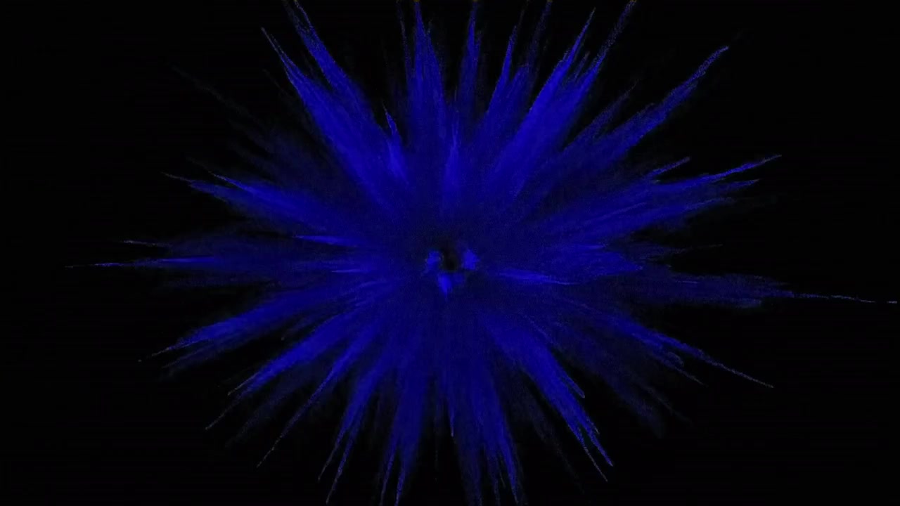 Blue Powder Explosion Against Black Background