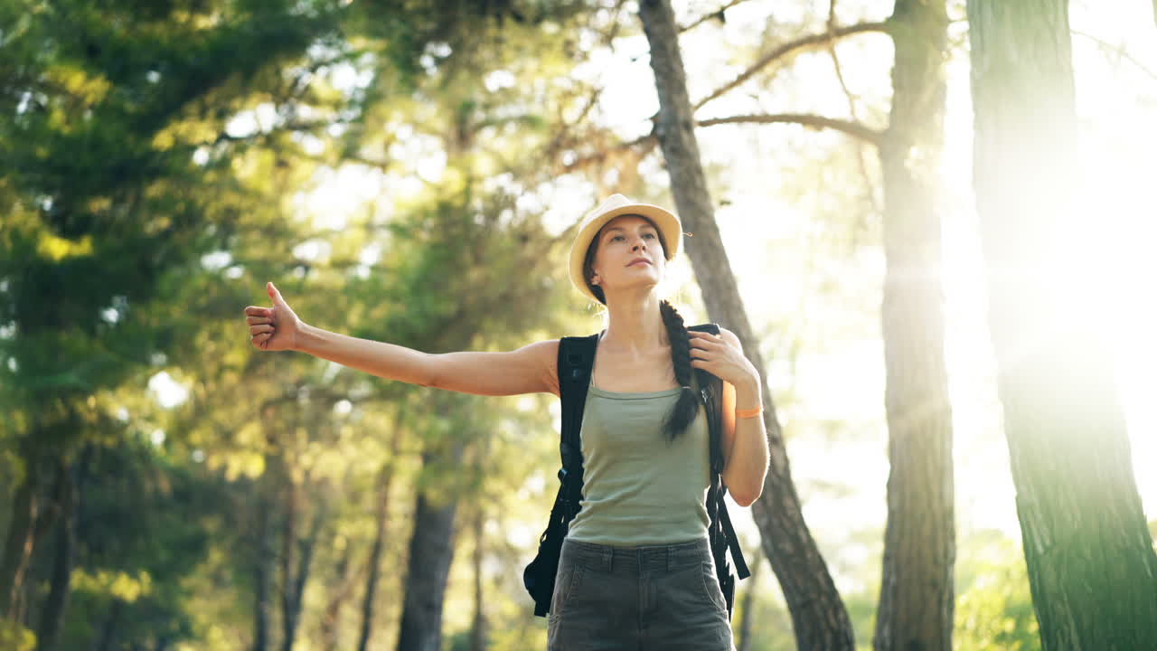 Woman Hiking in Forest, Requesting Ride
