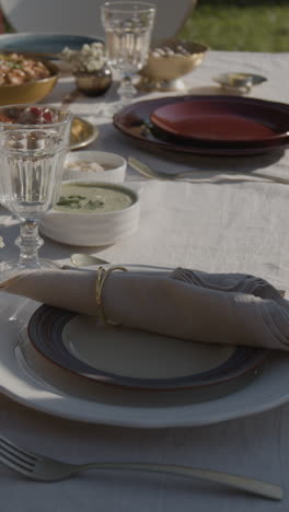 elegant outdoor table setting prepared for a meal