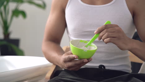 male preparing facial mask