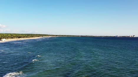 Trenc-and-Estanys-Beaches-in-Mallorca-Spain-near-Coto-Point-resort-area,-Aerial-low-approach-shot