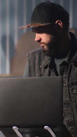 man working on laptop