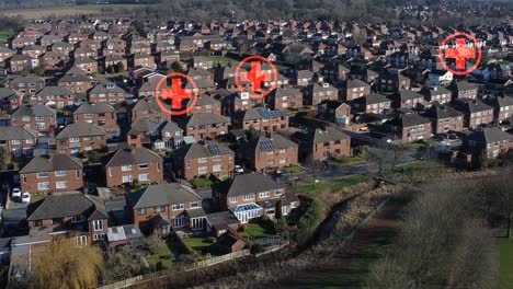 multiple medical red cross symbols flashing above neighbourhood house rooftops aerial view