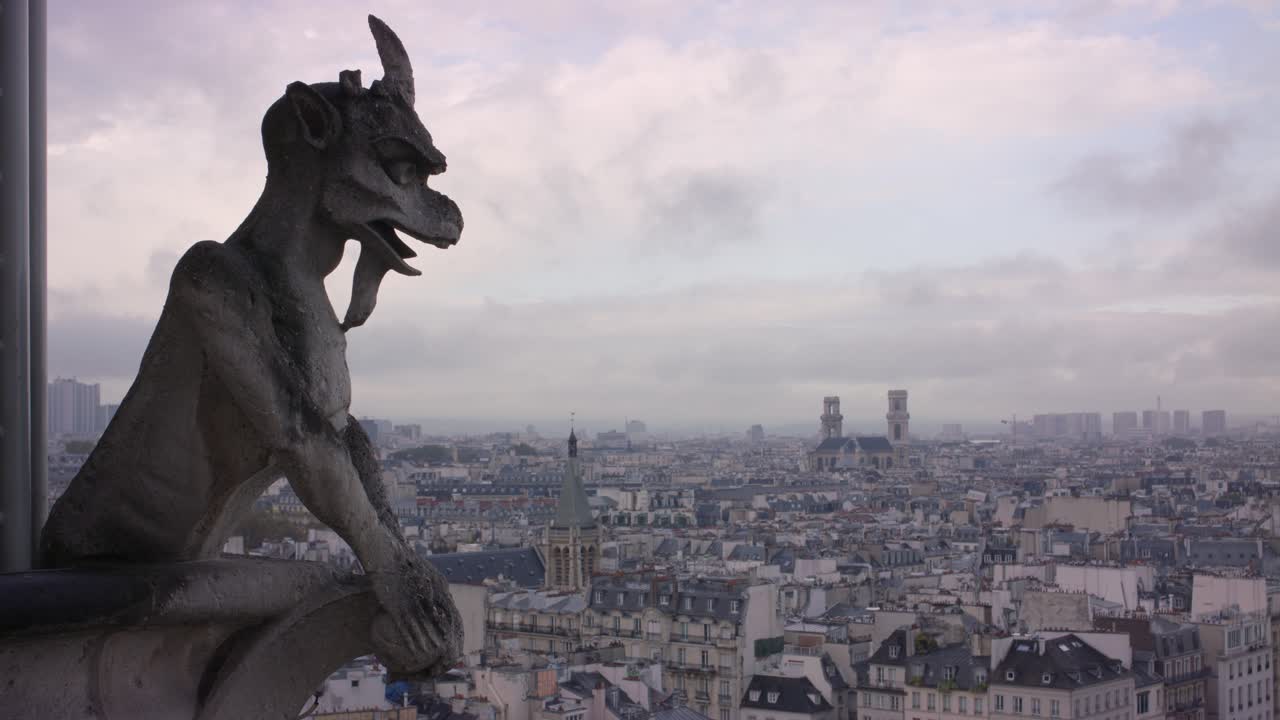 Gargoyle perched on Notre-Dame Cathedral, overlooking the city of Paris. The Gothic architecture contrasts with the expansive cityscape, showcasing the beauty of the iconic skyline