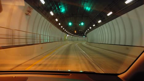 car drives in underrground tunnel