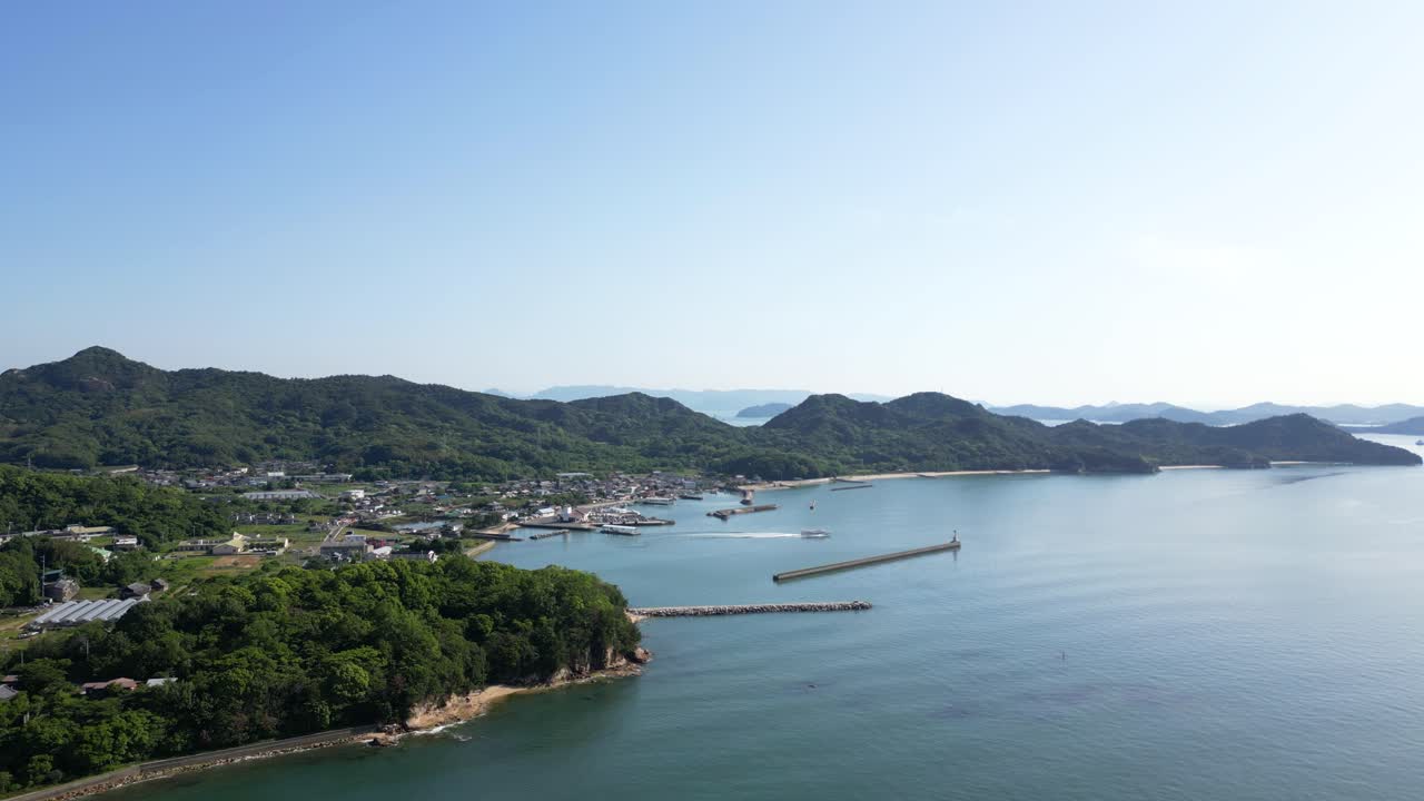 Drone flying forward toward perfect Seto Inland scenery at Teshima art island