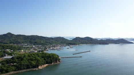 drone flying forward toward perfect seto inland scenery at teshima art island