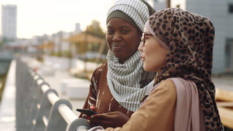 female friends talking outdoors