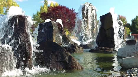 water fountains and water features surrounded by foliage 20 second slow motion slow pan video