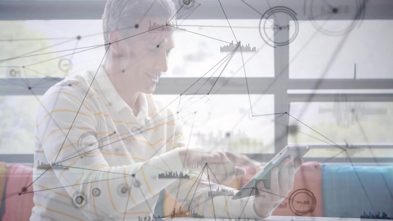 Man Using Digital Tablet with Data Visualization Overlay