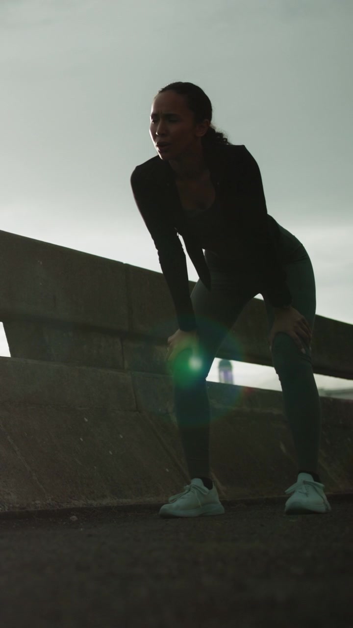 Exhausted Woman Resting After Outdoor Workout
