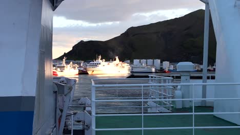 ship leaving westman islands, iceland