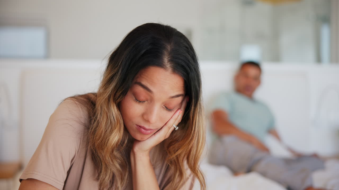 Divorce, stress and couple on a bed fighting