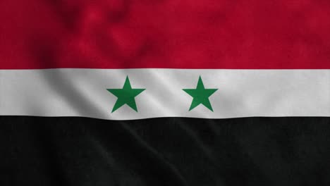 the national flag of syria flutters in the wind