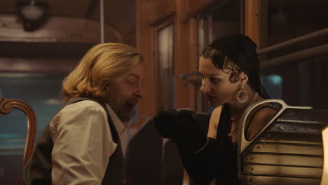 vintage couple communicating on a train