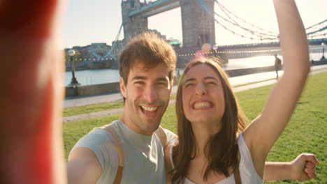 couple, selfie and travel holiday with westminster