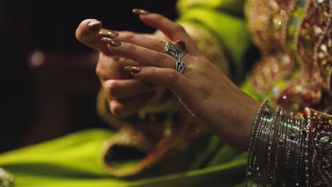 asian bride wearing her exquisite traditional jewelry up close