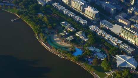 aerial view of southbank park and lagoon at the riverside in brisbane, australia