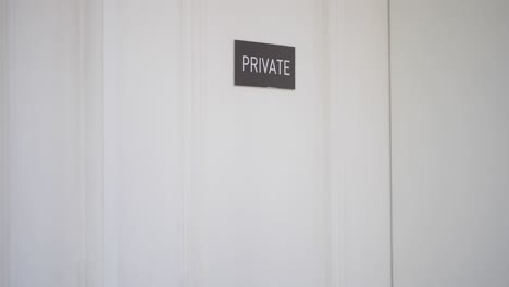 Private Room Sign on White Door