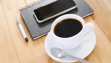 coffee with organizer and mobile phone