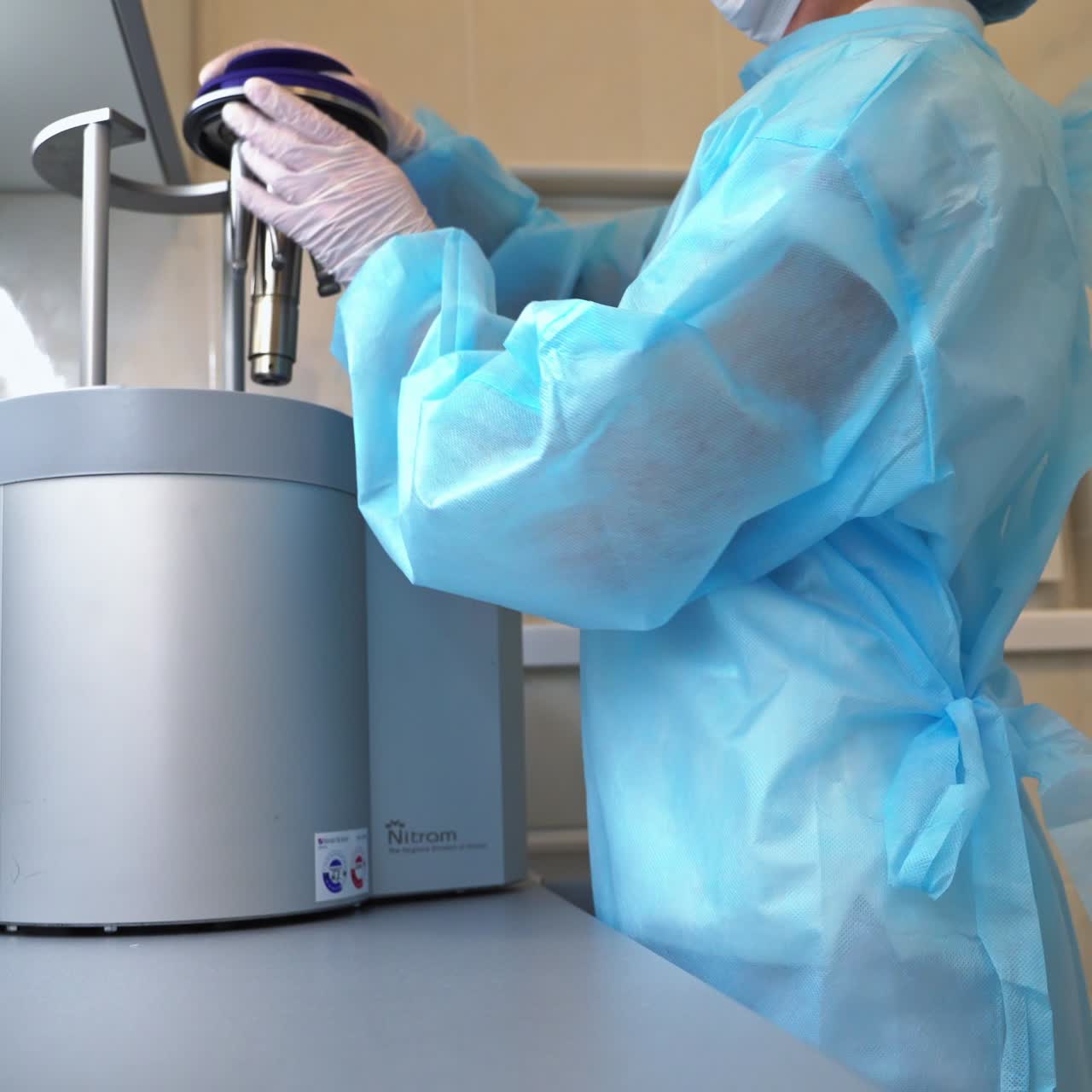 Nozzles from a dentistry machine prepared for sterilization. Female medic preparing tools for safe usage at dentistry