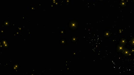 sparkling gold particles on black and green backgrounds