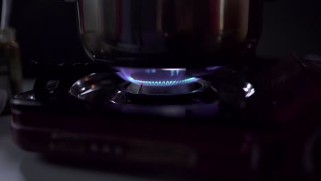 saucepan on gas burner in kitchen