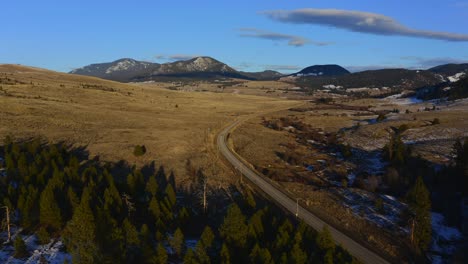 Stunning-Aerial-View-of-Kamloops'-Semi-Desert-Grasslands-under-Blue-Skies