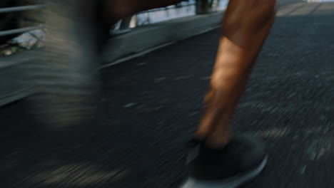 fitness, city and legs running on a bridge